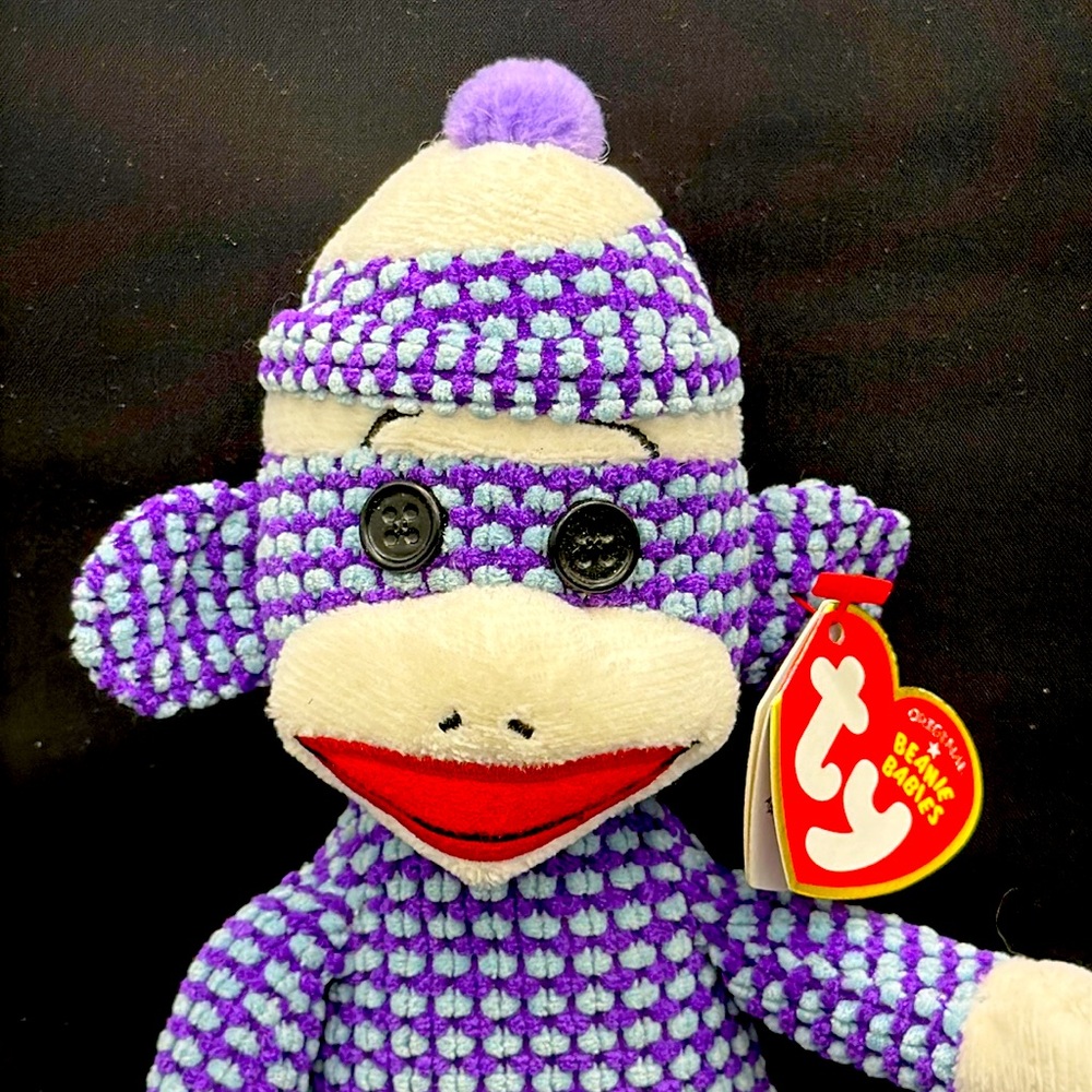 Ty beanie “Socks the Sock Monkey” in purple